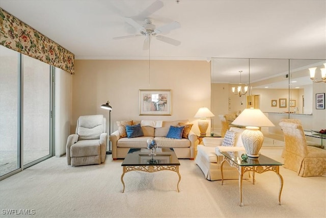 living room featuring ceiling fan with notable chandelier, ornamental molding, and light carpet