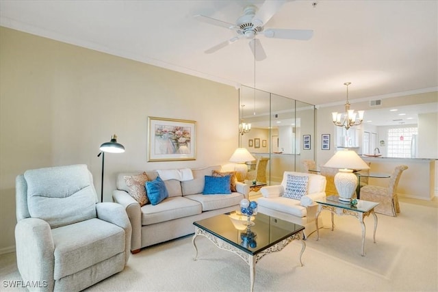 carpeted living room with ceiling fan with notable chandelier and ornamental molding