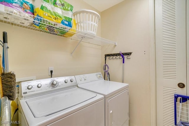 laundry area with washer and clothes dryer