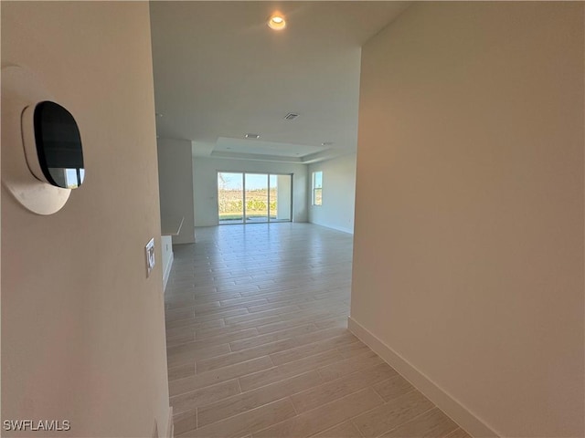 corridor featuring light hardwood / wood-style flooring