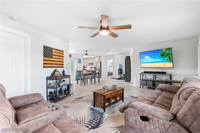 living room featuring ceiling fan