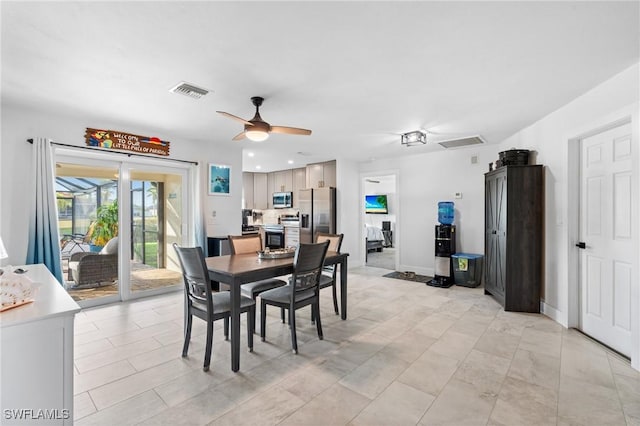 dining space featuring ceiling fan