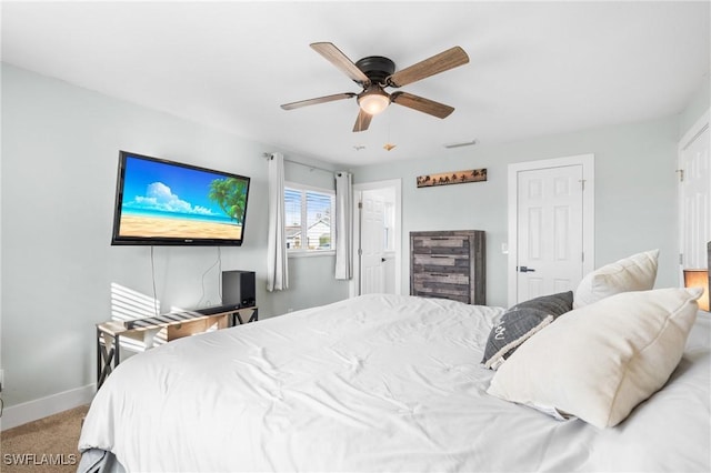 carpeted bedroom featuring ceiling fan