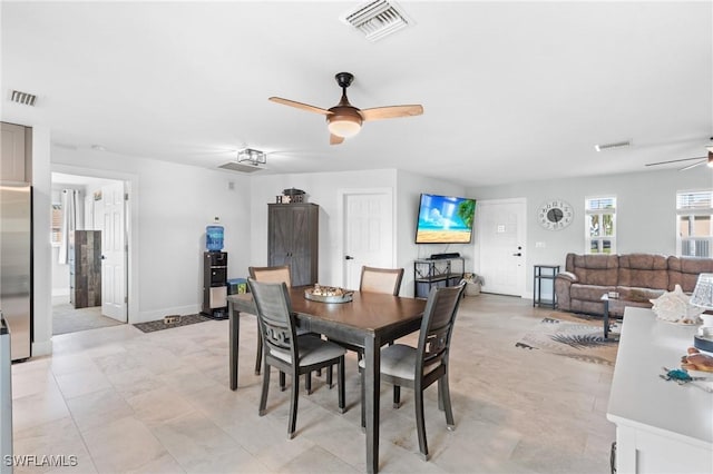 dining room with ceiling fan