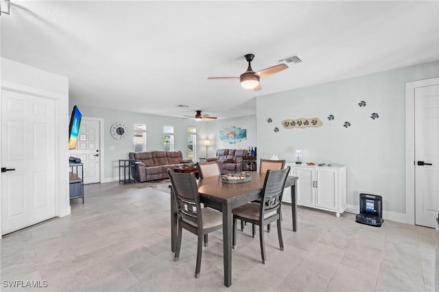 dining room with ceiling fan