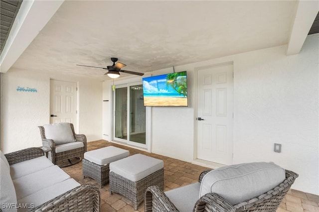 living room featuring ceiling fan