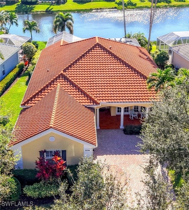 birds eye view of property featuring a water view