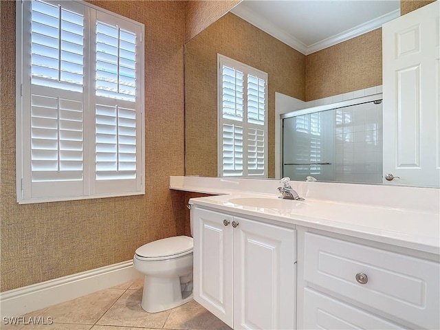 bathroom featuring a shower with door, tile patterned flooring, vanity, ornamental molding, and toilet