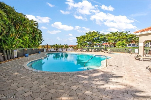 view of pool featuring a patio