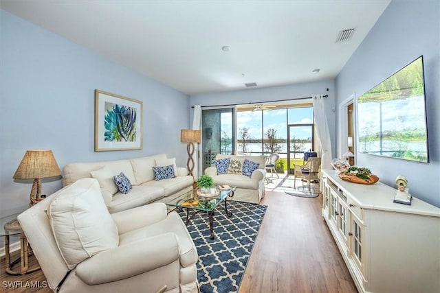 living room with hardwood / wood-style flooring