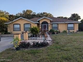 view of front of house with a front yard