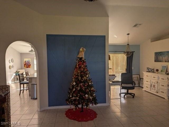 office area featuring ceiling fan and tile patterned flooring