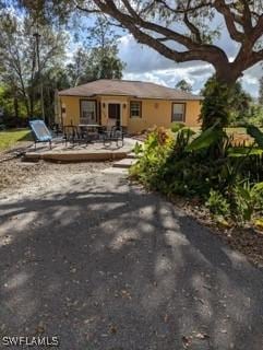 view of front of home with a deck