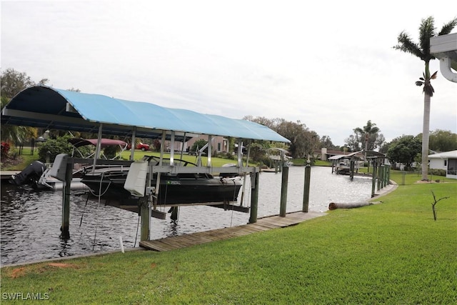 dock area featuring a water view and a yard