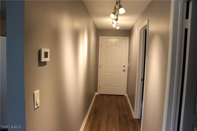 hallway featuring dark hardwood / wood-style floors