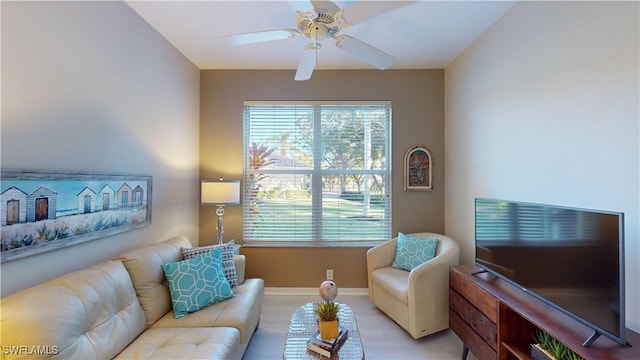 living room featuring ceiling fan