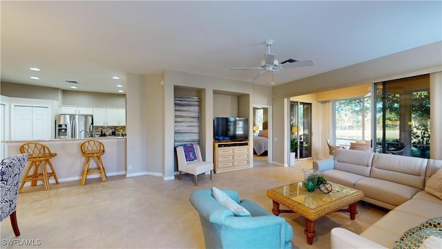 living room featuring ceiling fan