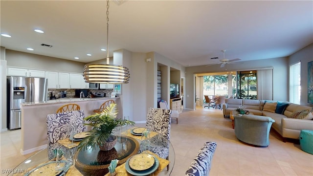 dining area featuring ceiling fan