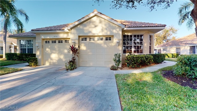 view of front of property featuring a garage