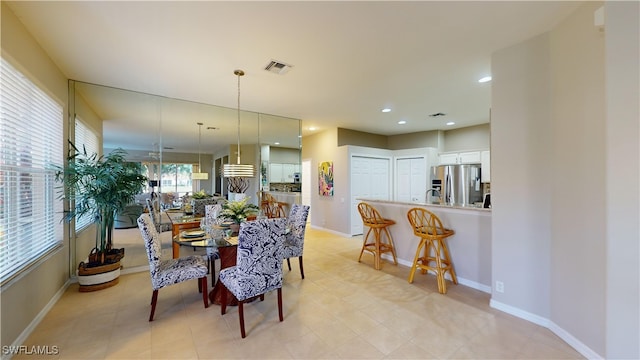 dining area featuring sink