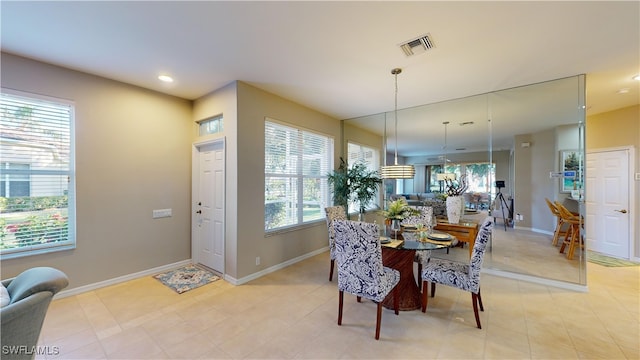 dining area featuring a wealth of natural light