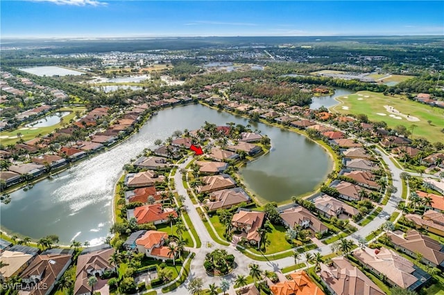 drone / aerial view with a water view