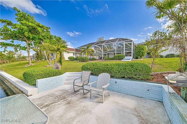 view of patio featuring a lanai