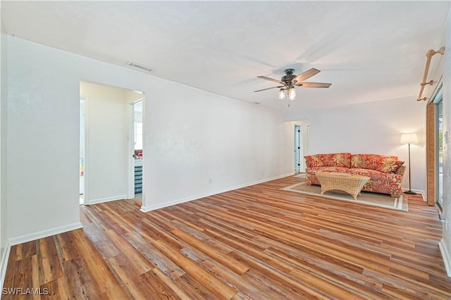 unfurnished room featuring ceiling fan and light hardwood / wood-style flooring