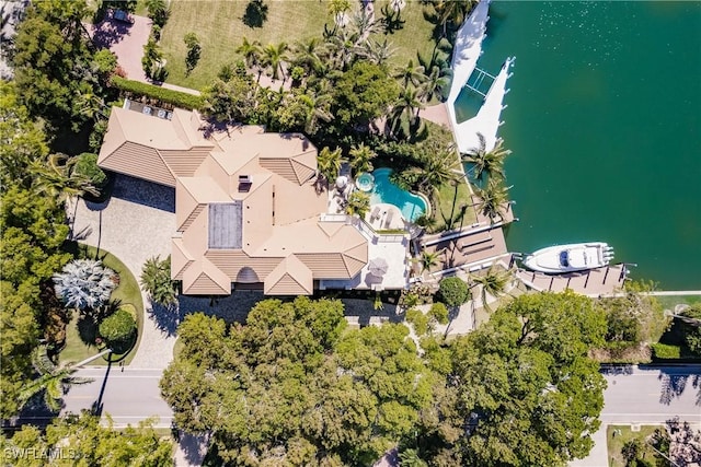 birds eye view of property featuring a water view