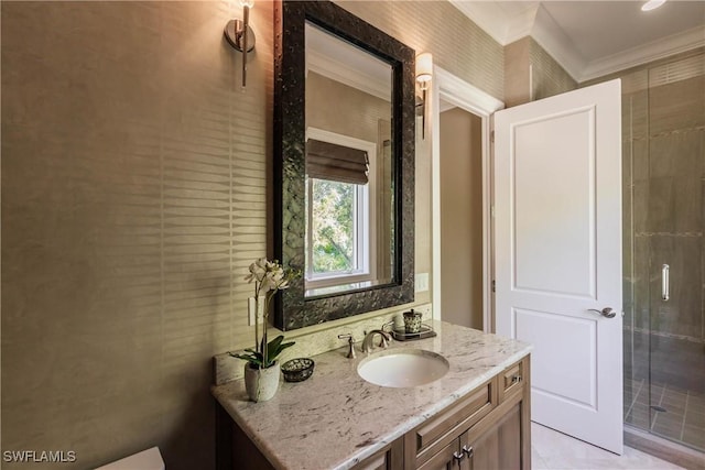 bathroom featuring vanity and crown molding