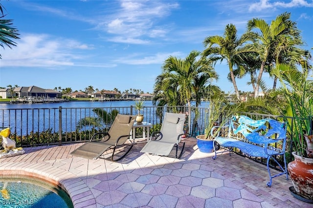 view of patio / terrace featuring a water view