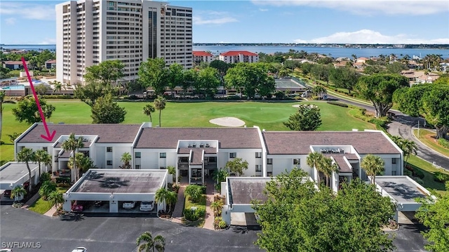 drone / aerial view featuring a water view