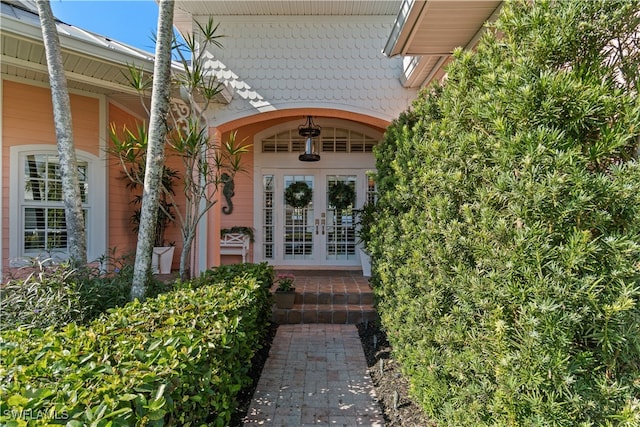 property entrance featuring french doors