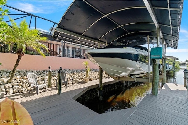 dock area with a water view