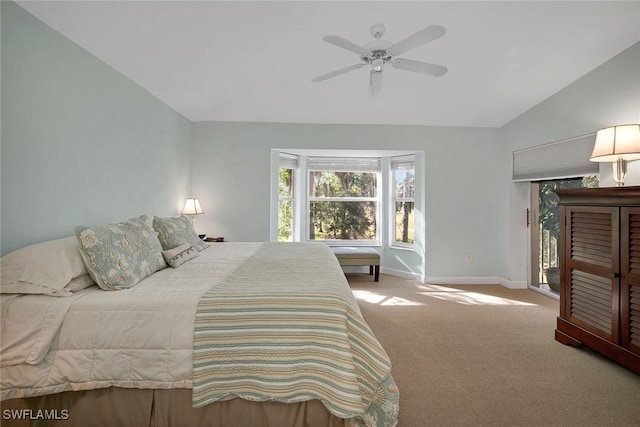 bedroom featuring carpet, ceiling fan, access to exterior, and lofted ceiling