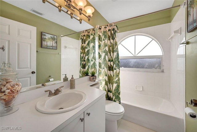 full bathroom featuring tile patterned flooring, shower / tub combo, vanity, and toilet