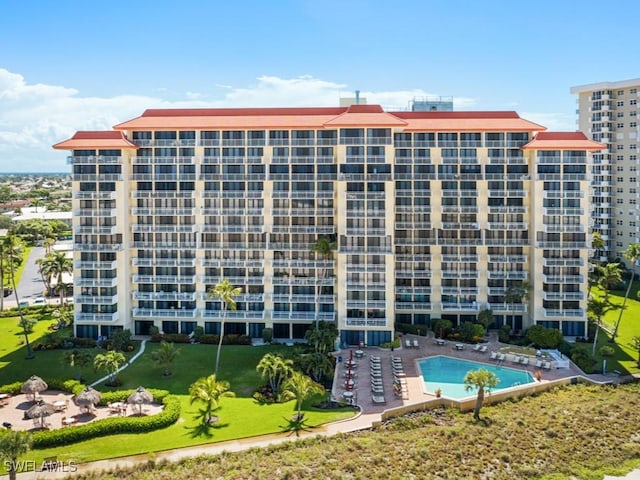 180 Seaview Ct Unit 504, Marco Island, FL 34145 - view of apartment building / complex with a community pool
