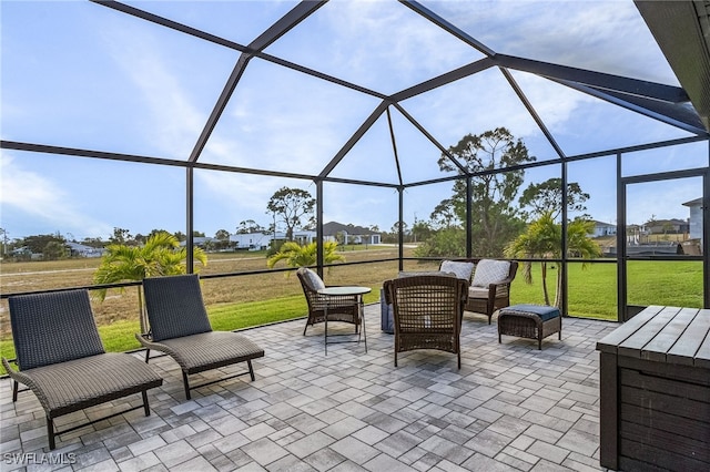 view of patio with a lanai