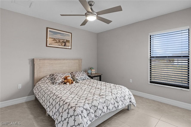 bedroom featuring ceiling fan and light tile patterned floors