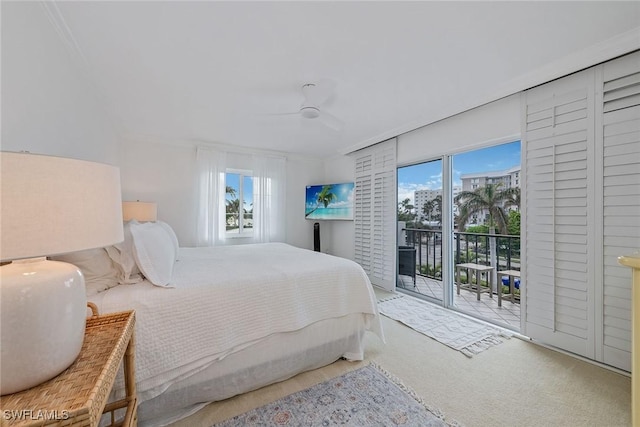 bedroom with carpet flooring, ceiling fan, crown molding, and access to outside