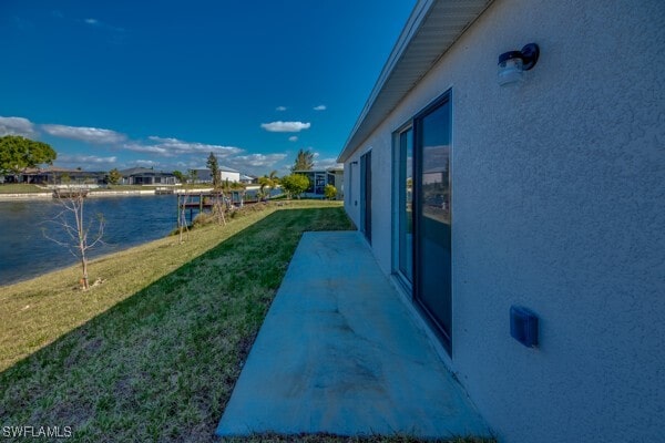 view of yard with a water view