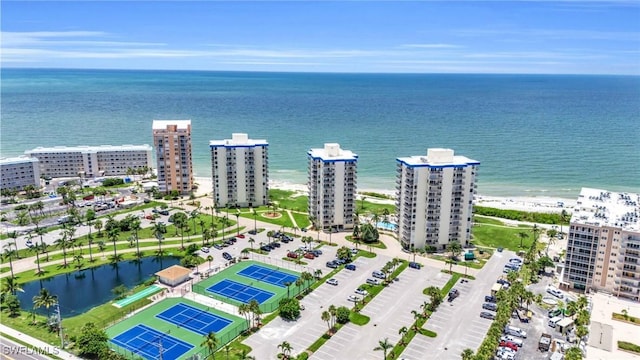 bird's eye view featuring a beach view and a water view