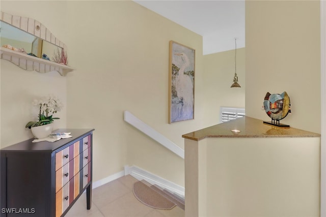 staircase with tile patterned flooring