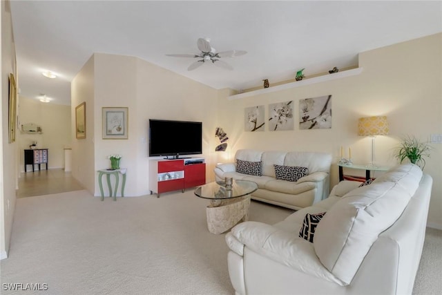 carpeted living room featuring ceiling fan