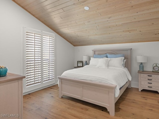 bedroom featuring wooden ceiling, vaulted ceiling, and light wood-type flooring