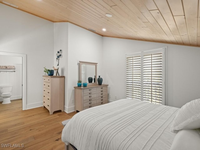 bedroom with ensuite bathroom, light wood-type flooring, wooden ceiling, and vaulted ceiling