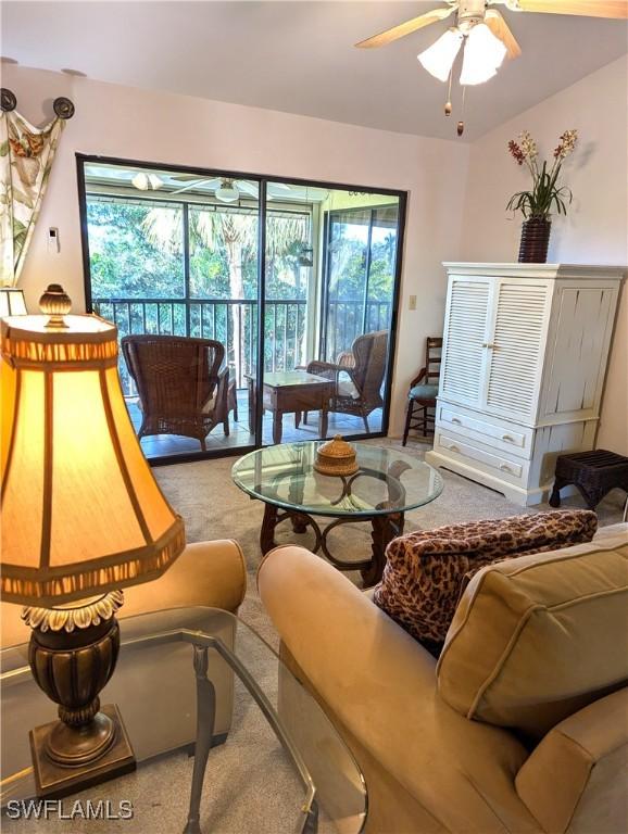 living room with ceiling fan