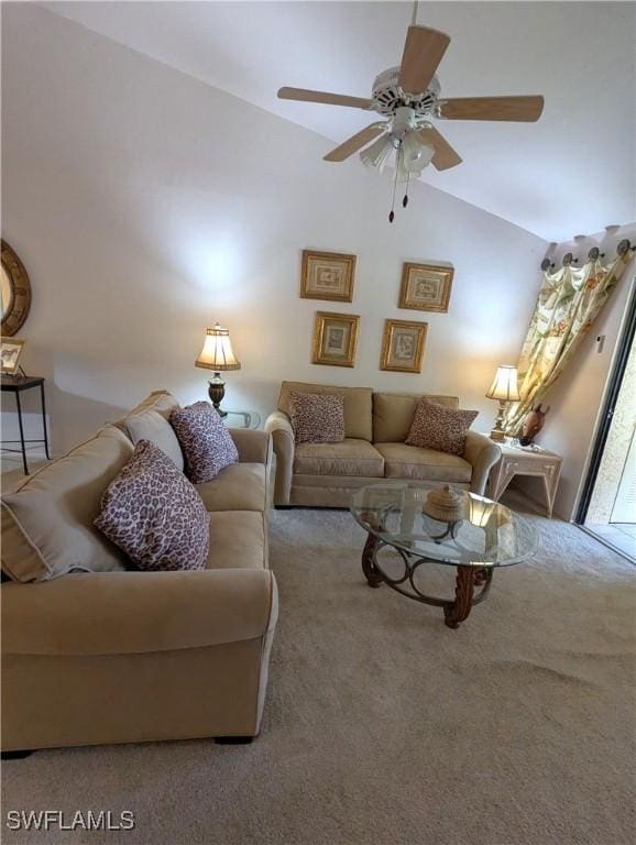 living room with vaulted ceiling, carpet floors, and ceiling fan