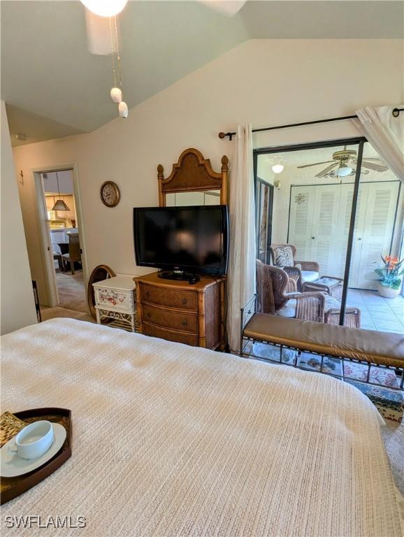 bedroom featuring lofted ceiling