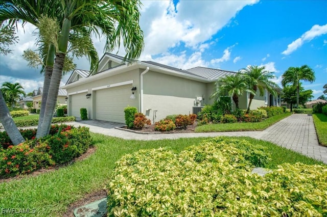 view of property exterior with a garage